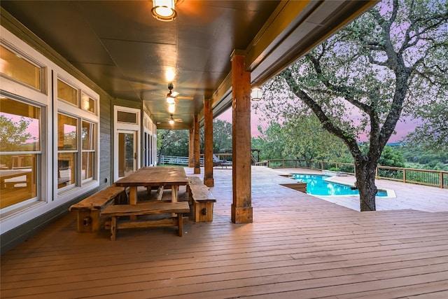 24205 State Highway 71 W, Spicewood, TX 78669 - deck at dusk featuring outdoor dining space