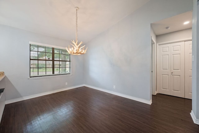 4310 Ponderosa Ln, Temple, TX 76502 - unfurnished dining area featuring a chandelier and dark wood finished floors