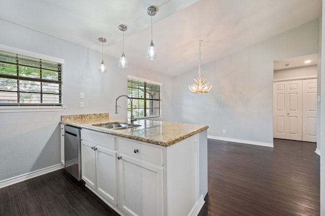 4310 Ponderosa Ln, Temple, TX 76502 - kitchen with a peninsula, dark wood-type flooring, white cabinets, a chandelier, and vaulted ceiling