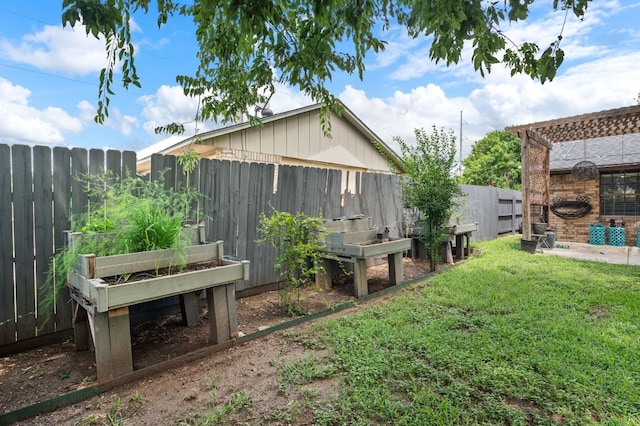 4310 Ponderosa Ln, Temple, TX 76502 - fenced backyard featuring a vegetable garden