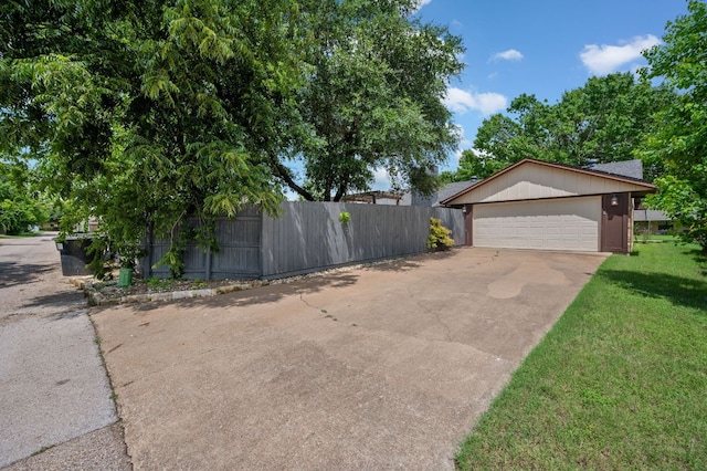 4310 Ponderosa Ln, Temple, TX 76502 - view of side of property featuring driveway and a garage