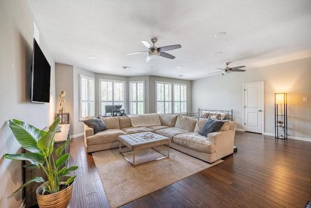 11612 Sierra Nevada, Austin, TX 78759 - living room with dark wood-style floors and a ceiling fan