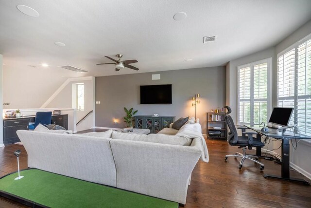 11612 Sierra Nevada, Austin, TX 78759 - living area with healthy amount of natural light, a desk, dark wood-style floors, and ceiling fan