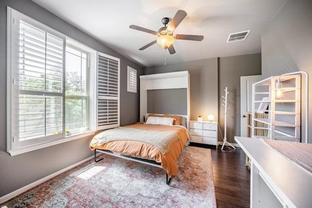 11612 Sierra Nevada, Austin, TX 78759 - bedroom featuring dark wood-style flooring and ceiling fan