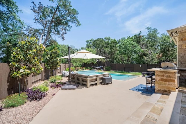 11612 Sierra Nevada, Austin, TX 78759 - fenced backyard with a patio area and a grill