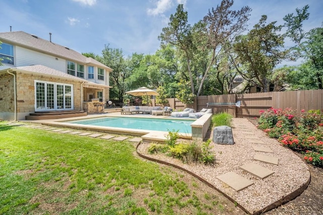 11612 Sierra Nevada, Austin, TX 78759 - view of pool featuring outdoor lounge area, a fenced backyard, and a patio area