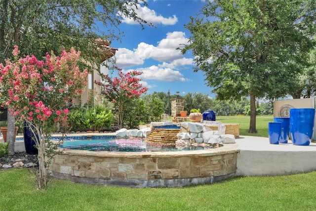 601 Strada Luca, Florence, TX 76527 - view of community featuring a lawn