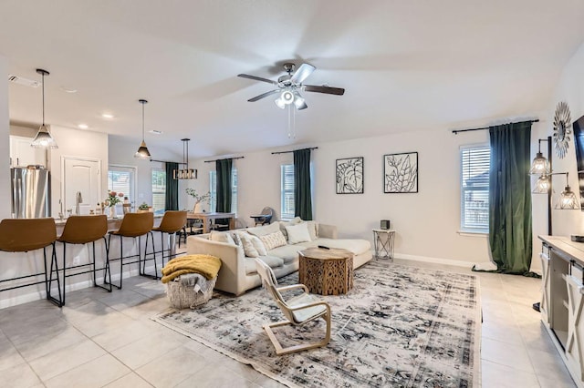236 Cinnamon Loop, Burnet, TX 78611 - living room with light tile patterned floors, a ceiling fan, and recessed lighting