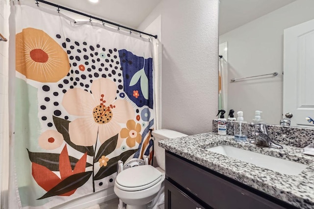 236 Cinnamon Loop, Burnet, TX 78611 - full bathroom with vanity, a textured wall, and curtained shower