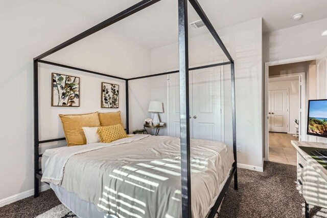 236 Cinnamon Loop, Burnet, TX 78611 - carpeted bedroom featuring baseboards