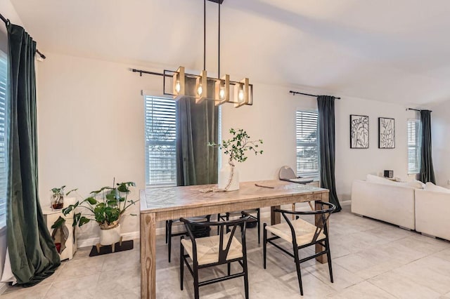 236 Cinnamon Loop, Burnet, TX 78611 - dining space featuring a chandelier and light tile patterned floors