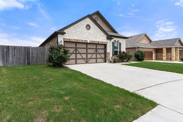 633 Weizenbock Ln, Austin, TX 78728 - view of front of house featuring stone siding, driveway, an attached garage, and roof with shingles