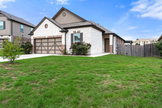 633 Weizenbock Ln, Austin, TX 78728 - view of front facade featuring stone siding, concrete driveway, and an attached garage