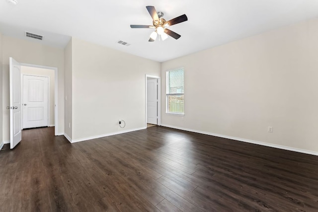 633 Weizenbock Ln, Austin, TX 78728 - spare room with a ceiling fan and dark wood-style flooring