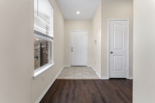 633 Weizenbock Ln, Austin, TX 78728 - doorway to outside with wood finished floors and baseboards