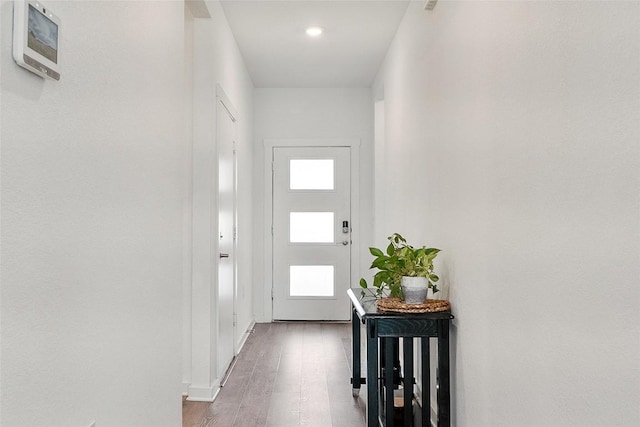 13821 Zuhause Dr, Pflugerville, TX 78660 - entryway featuring wood finished floors and baseboards