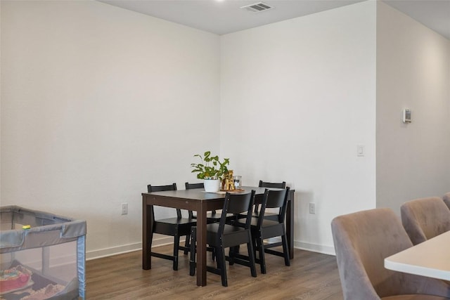 13821 Zuhause Dr, Pflugerville, TX 78660 - dining space with wood finished floors and baseboards