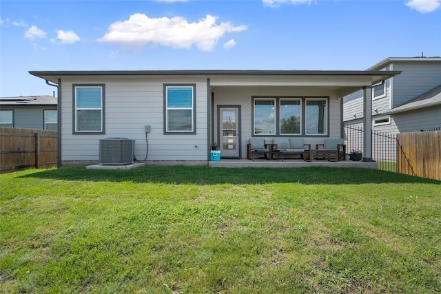 13821 Zuhause Dr, Pflugerville, TX 78660 - back of house with a fenced backyard, an outdoor living space, and a patio