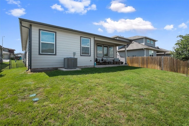 13821 Zuhause Dr, Pflugerville, TX 78660 - rear view of house featuring a fenced backyard and a patio area