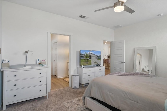 13821 Zuhause Dr, Pflugerville, TX 78660 - bedroom with light carpet and ceiling fan
