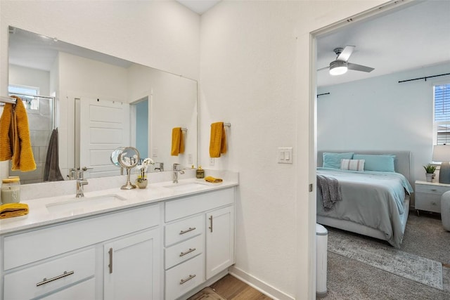 13821 Zuhause Dr, Pflugerville, TX 78660 - full bath with ensuite bath, double vanity, ceiling fan, and a shower with door