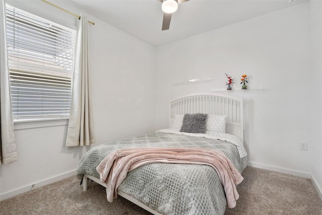 13821 Zuhause Dr, Pflugerville, TX 78660 - carpeted bedroom featuring baseboards and ceiling fan