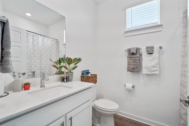 13821 Zuhause Dr, Pflugerville, TX 78660 - bathroom with vanity and wood finished floors