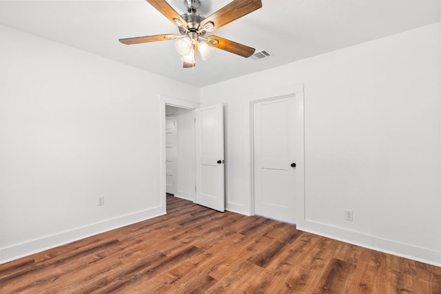 1020 S 23rd St, Temple, TX 76504 - unfurnished bedroom featuring wood finished floors and a ceiling fan