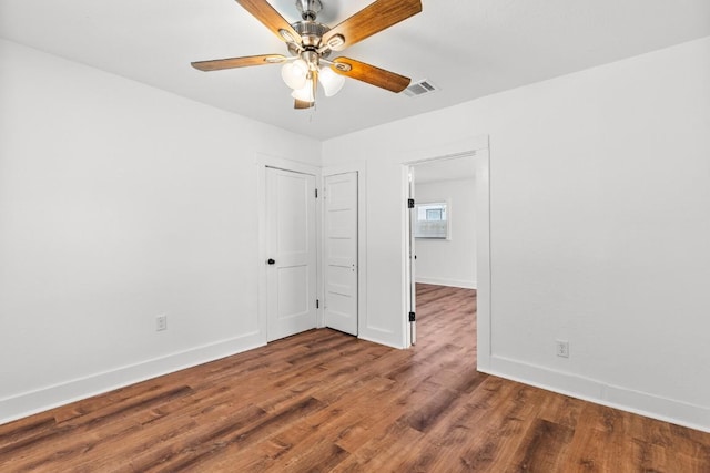 1020 S 23rd St, Temple, TX 76504 - spare room featuring wood finished floors and ceiling fan