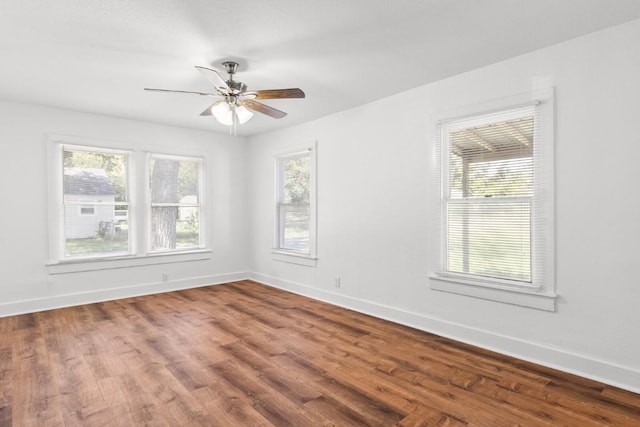 1020 S 23rd St, Temple, TX 76504 - spare room with plenty of natural light, wood finished floors, and ceiling fan