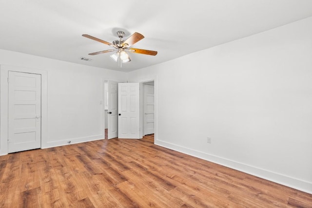 1020 S 23rd St, Temple, TX 76504 - unfurnished bedroom featuring light wood-style floors and ceiling fan