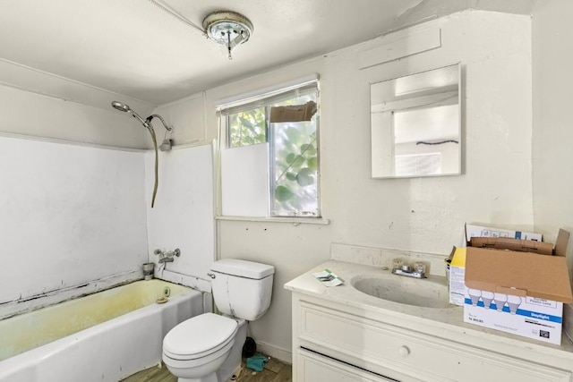 1020 S 23rd St, Temple, TX 76504 - bathroom featuring vanity, washtub / shower combination, and wood finished floors