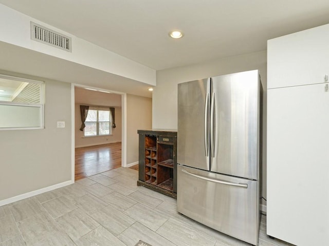 4408 Mount Vernon Dr, Austin, TX 78745 - kitchen featuring freestanding refrigerator and recessed lighting