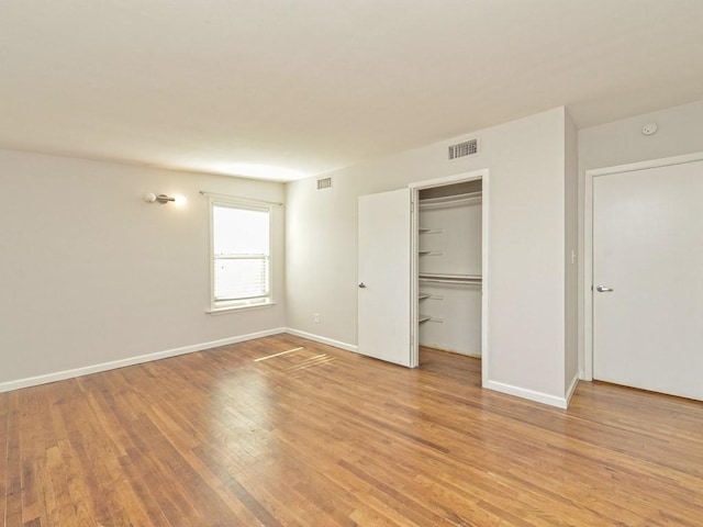4408 Mount Vernon Dr, Austin, TX 78745 - unfurnished bedroom with light wood-style flooring and a spacious closet