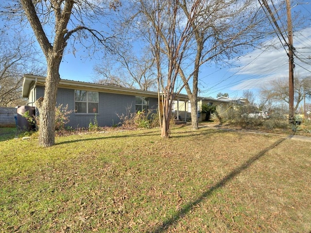 4408 Mount Vernon Dr, Austin, TX 78745 - view of front facade featuring brick siding and a front lawn