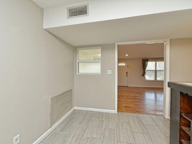 4408 Mount Vernon Dr, Austin, TX 78745 - corridor with light wood finished floors and baseboards