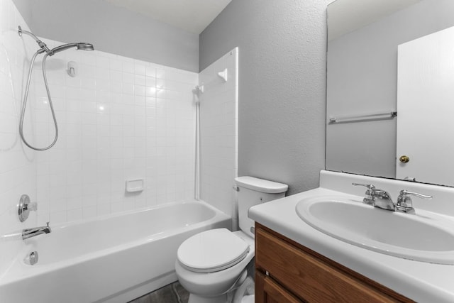 184 Atlantis, Kyle, TX 78640 - full bath featuring vanity, shower / bathtub combination, and a textured wall