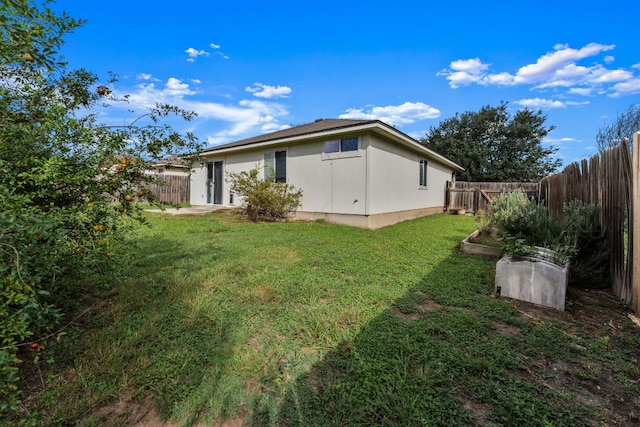 184 Atlantis, Kyle, TX 78640 - back of house featuring a fenced backyard