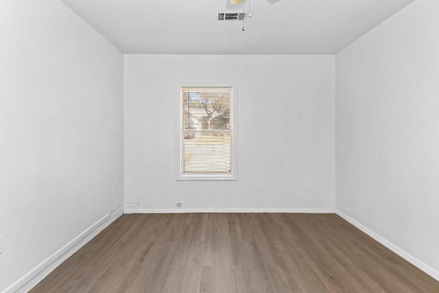 500 Honeysuckle Dr, Cedar Park, TX 78613 - unfurnished room with wood finished floors and baseboards