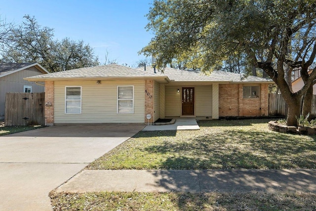 500 Honeysuckle Dr, Cedar Park, TX 78613 - ranch-style house with brick siding, roof with shingles, and concrete driveway