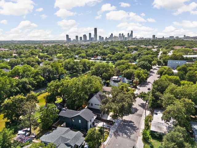 2917 Lyons Rd Unit 1, Austin, TX 78702 - drone / aerial view of city skyline and a tree filled landscape