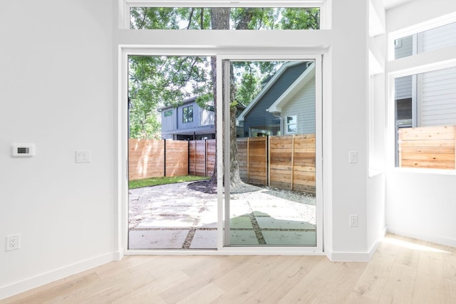 2917 Lyons Rd Unit 1, Austin, TX 78702 - entryway featuring wood finished floors and baseboards