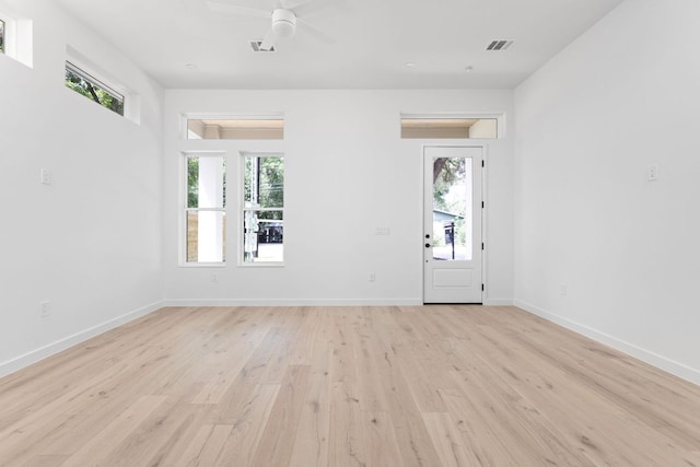 2917 Lyons Rd Unit 1, Austin, TX 78702 - unfurnished room with ceiling fan, healthy amount of natural light, and light wood-type flooring