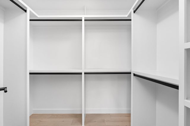 2917 Lyons Rd Unit 1, Austin, TX 78702 - spacious closet featuring wood finished floors