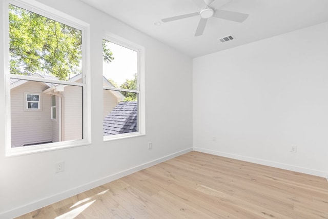 2917 Lyons Rd Unit 1, Austin, TX 78702 - unfurnished room with light wood-style floors and a ceiling fan