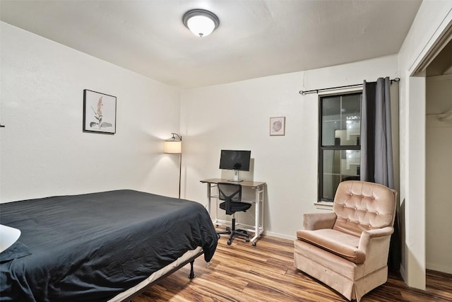 2503 Parker Ln Unit A & B, Austin, TX 78741 - bedroom with wood finished floors and baseboards