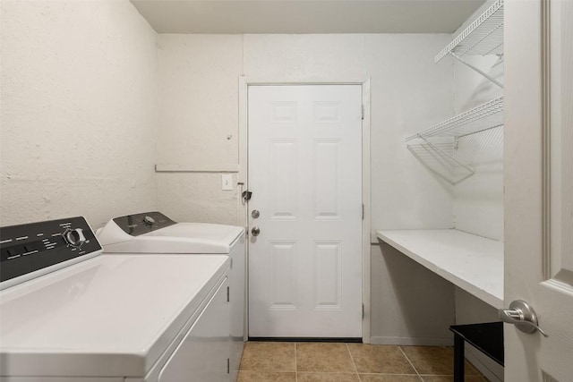 2503 Parker Ln Unit A & B, Austin, TX 78741 - laundry area featuring washer and clothes dryer and light tile patterned flooring