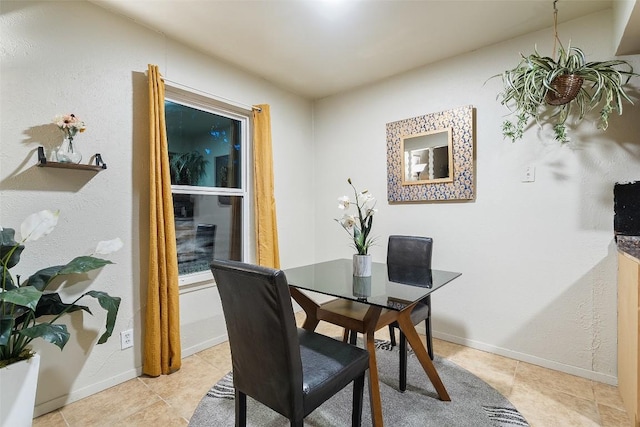 2503 Parker Ln Unit A & B, Austin, TX 78741 - dining room featuring baseboards and light tile patterned floors