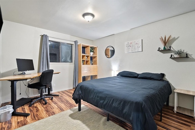 2503 Parker Ln Unit A & B, Austin, TX 78741 - bedroom featuring wood finished floors and an office area