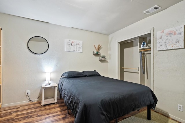 2503 Parker Ln Unit A & B, Austin, TX 78741 - bedroom featuring baseboards and wood finished floors